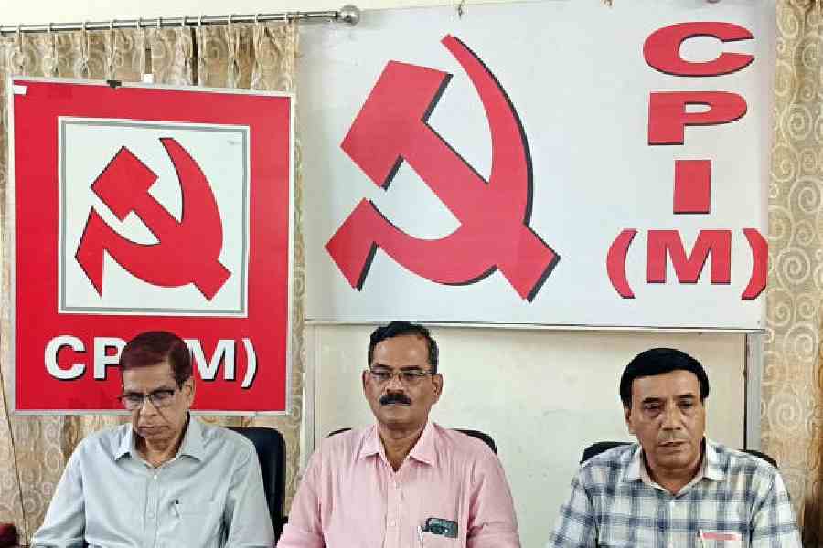 Dilip Singh (centre), the CPM candidate of the Dabgram-Fulbari Assembly constituency, at the press conference in Siliguri on Monday. Picture by Passang Yolmo