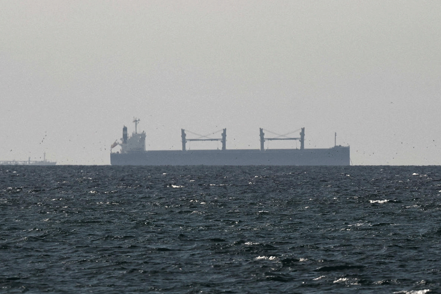 FILE PHOTO: A cargo ship in the Gulf, near the Strait of Hormuz