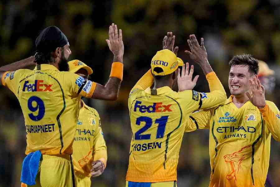 Chennai Super Kings' Noor Ahmad, right, with teammates celebrates after taking the wicket of Kolkata Knight Riders' captain Ajinkya Rahane during the Indian Premier League (IPL) 2026 T20 cricket match between Chennai Super Kings and Kolkata Knight Riders, at MA Chidambaram Stadium in Chennai, Tamil Nadu, Tuesday, April 14, 2026.