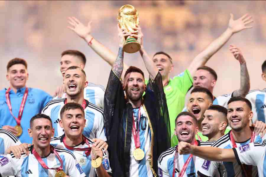 Lionel Messi, along with his teammates, after Argentina won the 2022 Qatar World Cup, at the Lusail Stadium on December 18, 2022. 