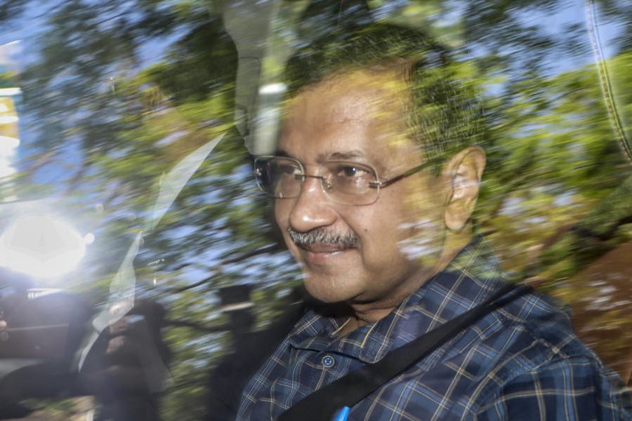 AAP National Convener Arvind Kejriwal arrives at the Delhi High Court for a hearing in a case related to the excise policy, in New Delhi, Monday, April 13, 2026.