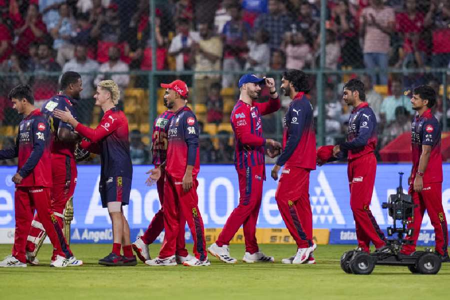 Players shake hands after Royal Challengers Bengaluru won the Indian Premier League (IPL) 2026 T20 cricket match between Royal Challengers Bengaluru and Lucknow Super Giants, at M Chinnaswamy Stadium in Bengaluru, Karnataka, Wednesday, April 15, 2026.
