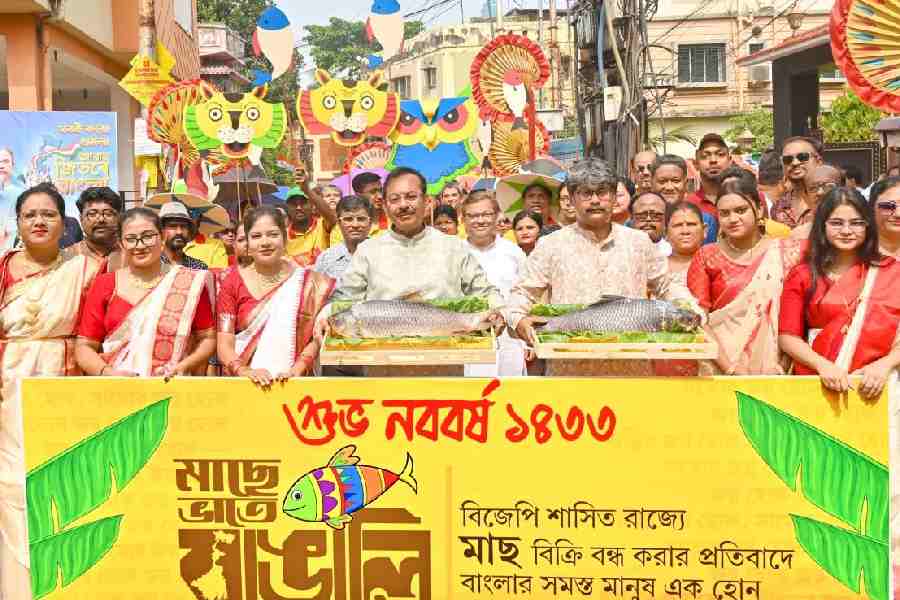 Trinamool’s Aroop Biswas in a rally with trays of fish in Tollygunge on Poila Baisakh