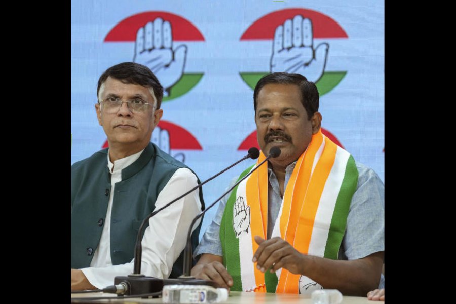 Lok Sabha MP Ajay Nishad addresses media after joining Congress party in the presence of senior party leader Pawan Khera
