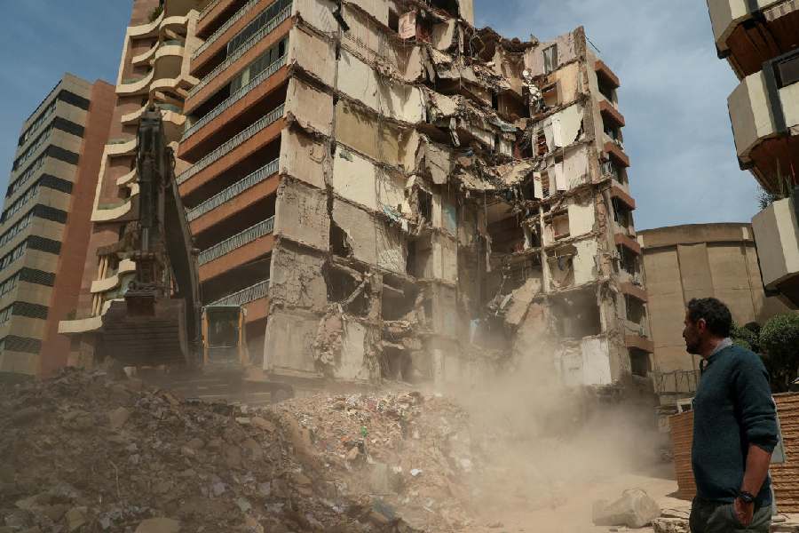 Wael Sabbagh, whose mother Afaf Sidaoui and brother Hassan, were killed in an Israeli strike on an apartment building on April 8, stands at the strike site in Tallet El Khayat in Beirut, Lebanon, April 15, 2026.
