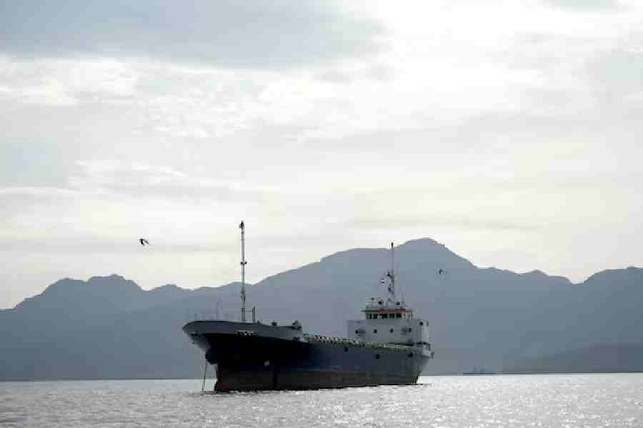 A vessel in the Strait of Hormuz, off the coast of Oman’s Musandam province, April 12, 2026.