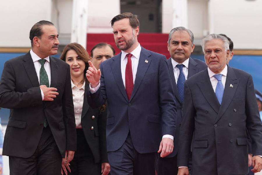 US Vice President JD Vance walks with Pakistan's Chief of Defence Forces and Chief of Army Staff Field Marshal Asim Munir and Pakistani Deputy Prime Minister and Foreign Minister Mohammad Ishaq Dar after arriving for talks with Iranian officials in Islamabad, Pakistan, Saturday, April 11, 2026.