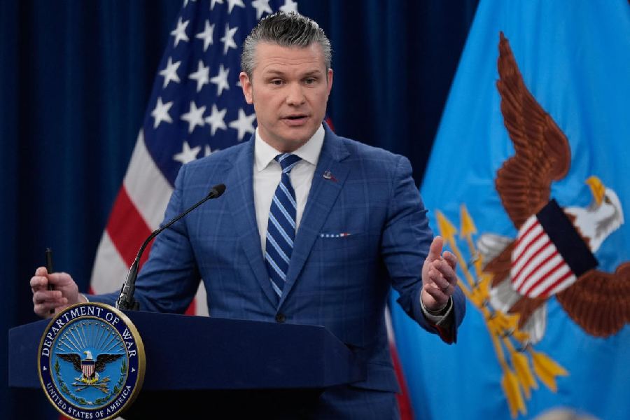 Defense Secretary Pete Hegseth speaks to members of the media during a press briefing at the Pentagon in Washington, Wednesday, April 8, 2026.