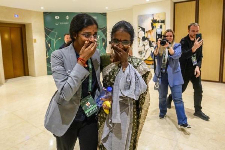 Rameshbabu Vaishali (left) celebrates with mother Nagalakshmi