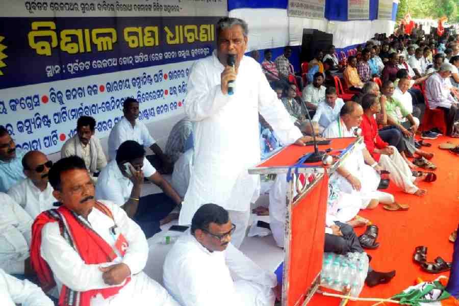 Congress leader Srikant Jena speaks at the dharna siteon Thursday