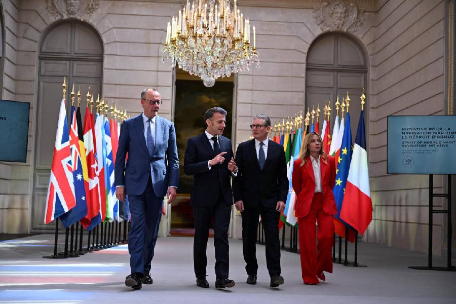 French President Emmanuel Macron, accompanied by Italian Prime Minister Giorgia Meloni, British Prime Minister Keir Starmer and German Chancellor Friedrich Merz, arrive at the Elysee Palace for a conference on the initiative for maritime navigation in the Strait of Hormuz, in Paris, France, on April 17, 2026.
