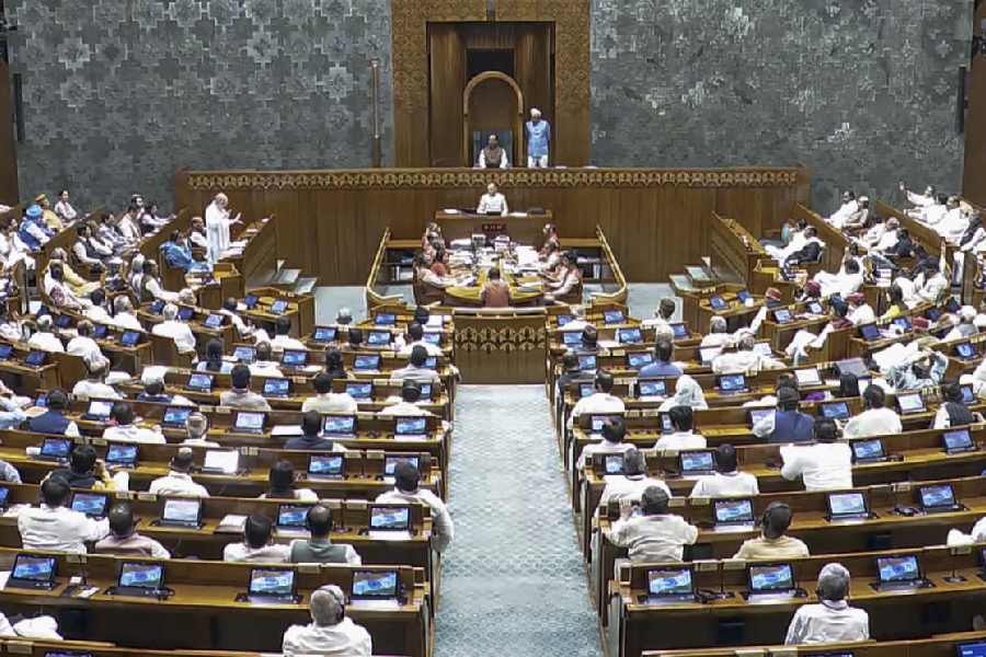 Union Home Minister Amit Shah speaks in the Lok Sabha during the Special session of Parliament, in New Delhi, Friday, April 17, 2026.