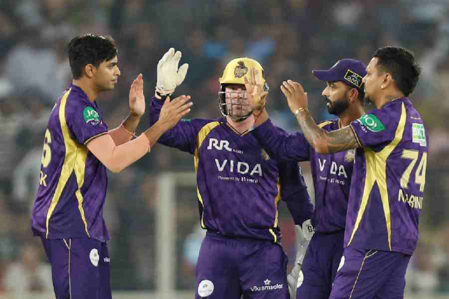 Kolkata Knight Riders players celebrate during match against Gujarat Titans.