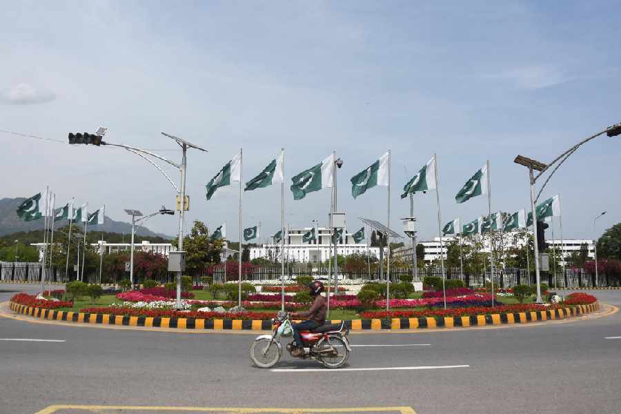 Pakistani flags installed in front of the President's house, as Pakistan prepares to host the US and Iran for the second phase of peace talks in Islamabad, Pakistan, April 18, 2026.
