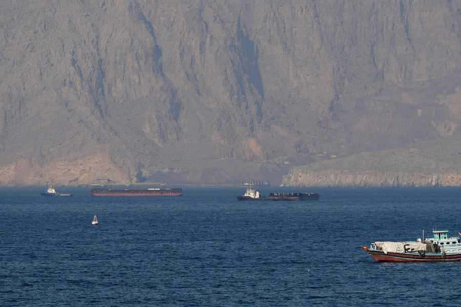 Ships and tankers in the Strait of Hormuz off the coast of Musandam, Oman, April 18, 2026.