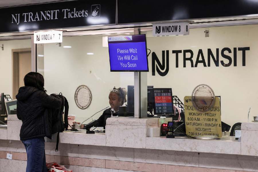 A commuter purchases a ticket at Penn Station on the day of the announcement of public transit ticket prizes to World Cup games in New Jersey, in New York City, U.S., April 17, 2026.