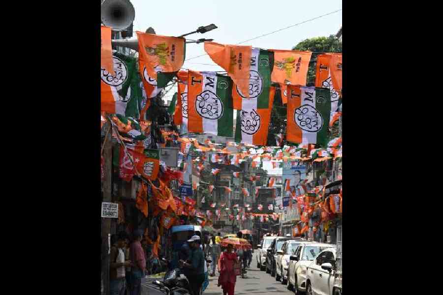 Flags of multiple political parties strung across a road near Jadu Babu’s Bazar. Picture by Sanat Kr Sinha