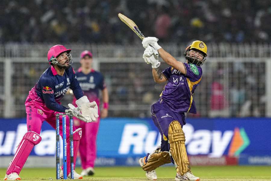 Kolkata Knight Riders' Rinku Singh, right, plays a shot during the Indian Premier League (IPL) 2026 T20 cricket match between Kolkata Knight Riders and Rajasthan Royals, at Eden Gardens in Kolkata, West Bengal, Sunday, April 19, 2026.