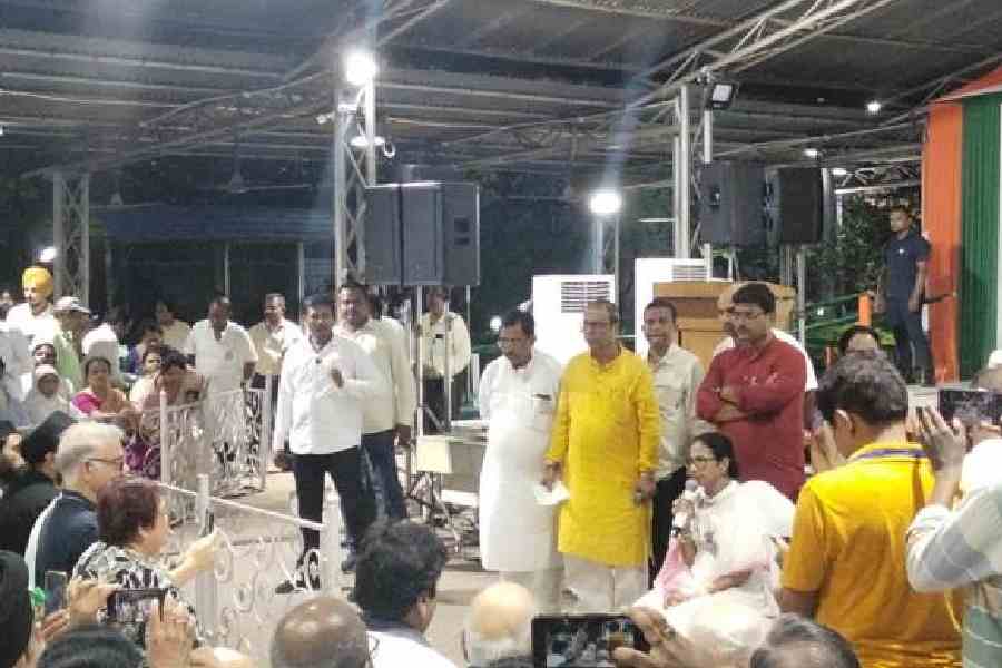 Chief minister Mamata Banerjee speaks with voters at Uttam Udyan on Sunday