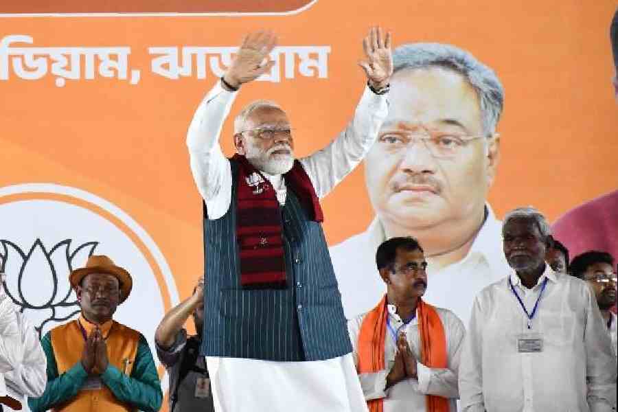 Narendra Modi waves to his supporters at the rally in Jhargram on Sunday. Picture by Sudipta Mitra 