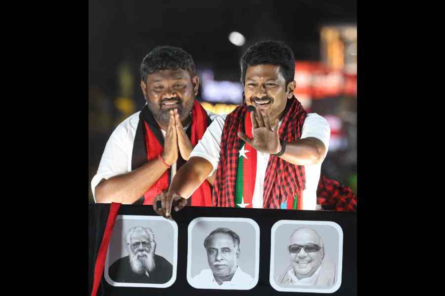 (Left to right) DMK Chengalpattu candidate Karthik Dhandapani with TN deputy CM Udhayanidhi Stalin at a roadshow in Chengalpattu constituency on April 13.