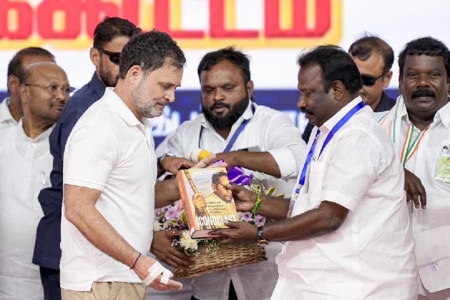 Leader of Opposition in the Lok Sabha Rahul Gandhi being felicitated during a public meeting, ahead of the Tamil Nadu Assembly elections, at Ponneri, in Tiruvallur district, Saturday, April 18, 2026. Tamil Nadu Congress Committee President K Selvaperunthagai is also seen.