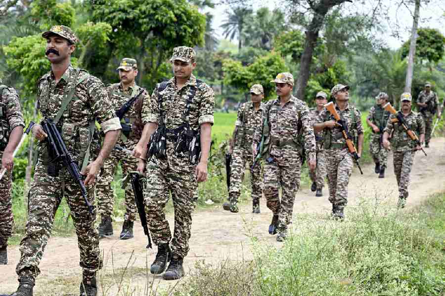 Central Reserve Police Force personnel patrol amid heightened security ahead of the West Bengal Assembly elections, at Hariyakuri village in Malda, Thursday, April 9, 2026.