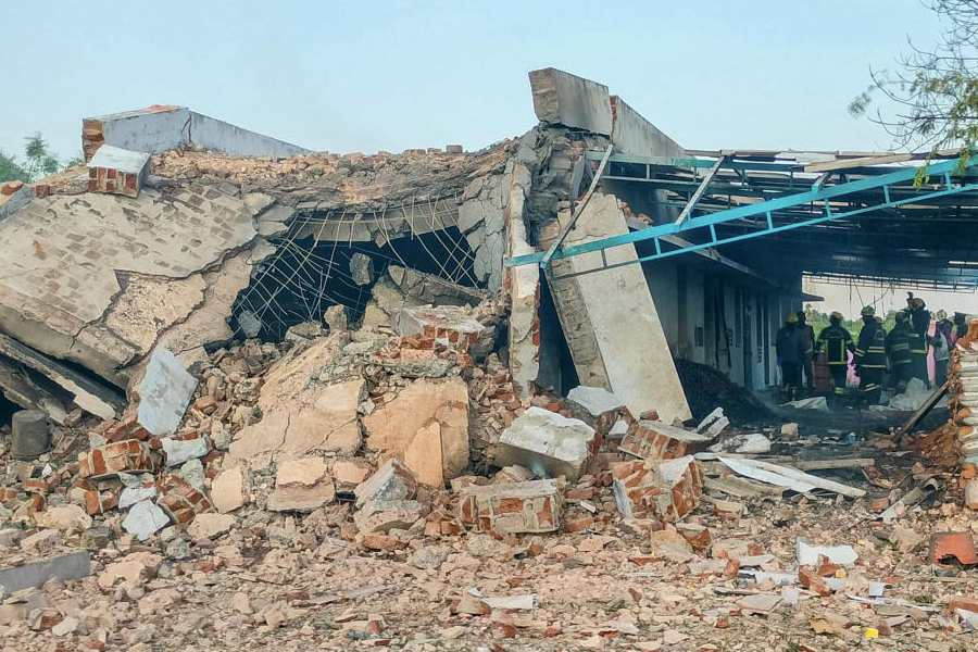 Rescue personnel at the site after a blast at a firecracker factory, where at least 16 people were allegedly killed and several injured, at Kattanarpatti, in Virudhunagar district, Tamil Nadu, Sunday, April 19, 2026.