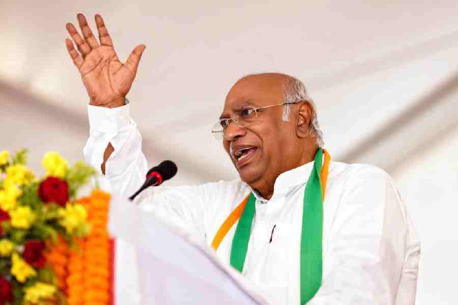 Congress president Mallikarjun Kharge addresses a public meeting ahead of the Bengal Assembly elections, in Cooch Behar on Monday. 