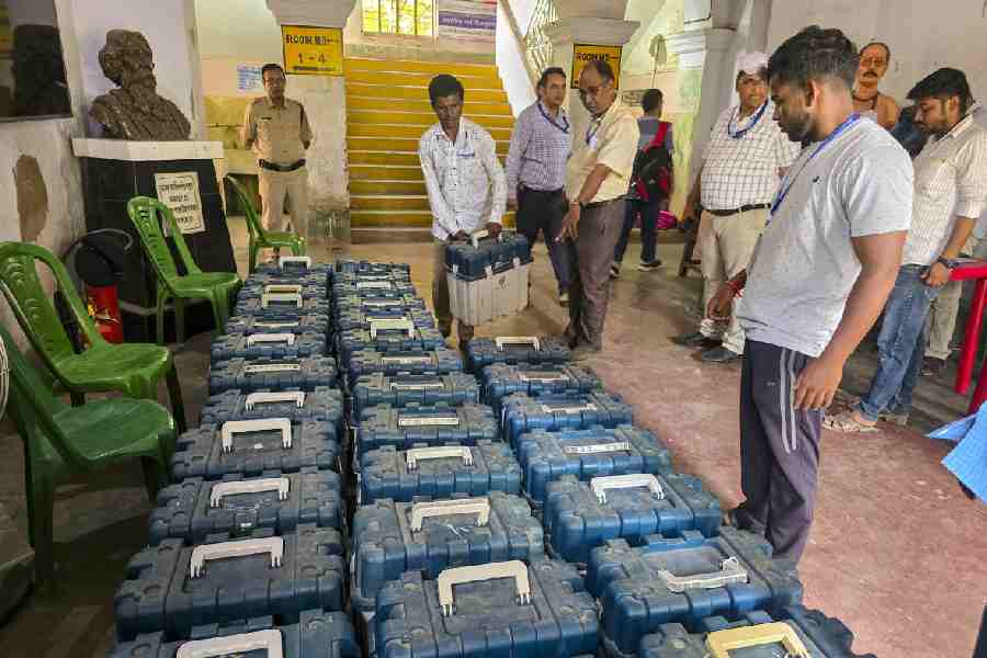 Officials stack EVMs in Birbhum on Monday. 