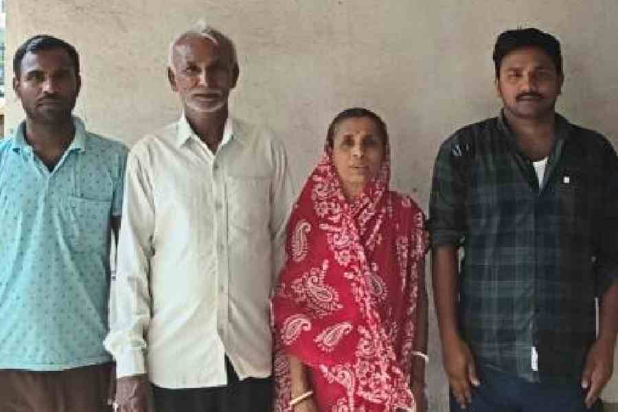 Biswanath Dhali, his wife, Shikharani, and sons, Barun and Rajesh
