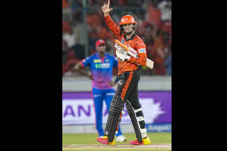 Sunrisers Hyderabad’s Abhishek Sharma celebrates his century against Delhi Capitals in Hyderabad on Tuesday. The opener slammed 135 not out off 68 balls.