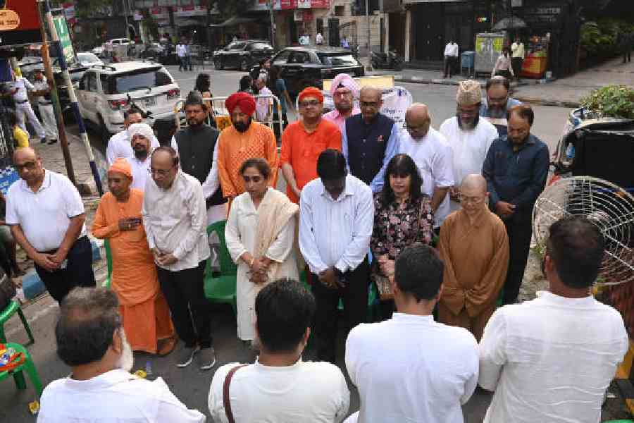 The prayer meeting outside Allen Park on Tuesday. Pictures by Bishwarup Dutta