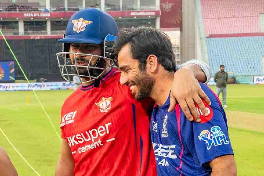 LSG captain Rishabh Pant shares a laugh with Rajasthan Royals’ Ravi Bishnoi (right) on the sidelines of a practice session.