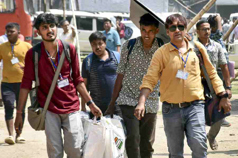 Polling officials leave for their respective booths