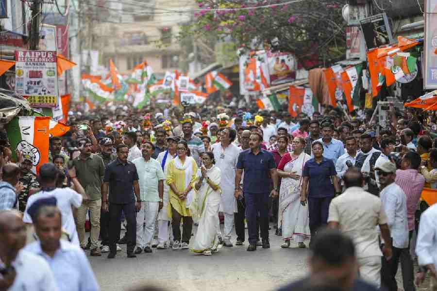Mamata Banerjee walks during a roadshow