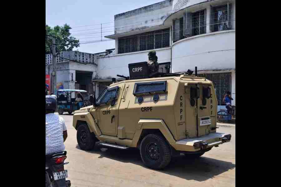 An armoured CRPF vehicle patrols an area in Murshidabad’s Samserganj on Wednesday.