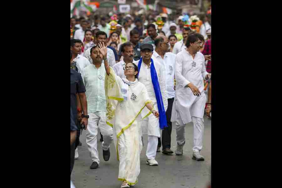 Mamata Banerjee during a road show at Shibpur constituency in Howrah district on Wednesday. 
