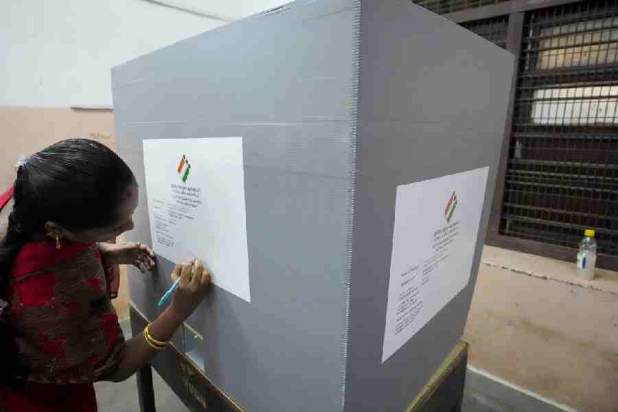 A poll official makes arrangements at a polling station