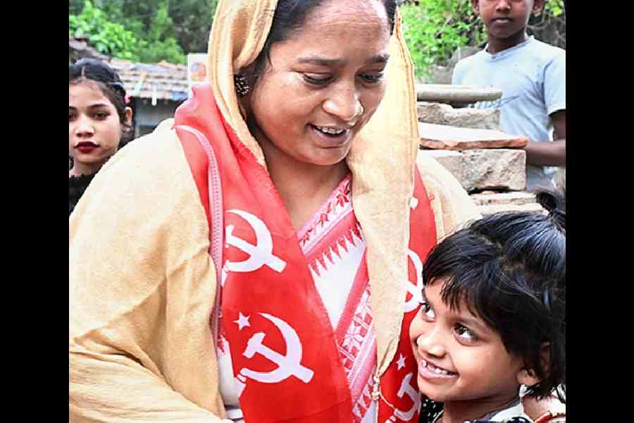 Sabina Yasmin interacts with a child in Plassey. Picture by Pranab Debnath