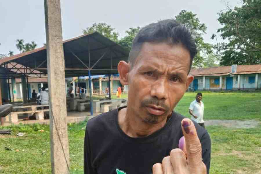 Lalbahadur Mangar after casting his vote on the closed Madhu tea estate on Thursday. 