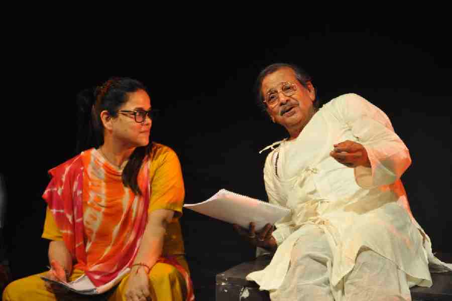 Two theatre actors on stage