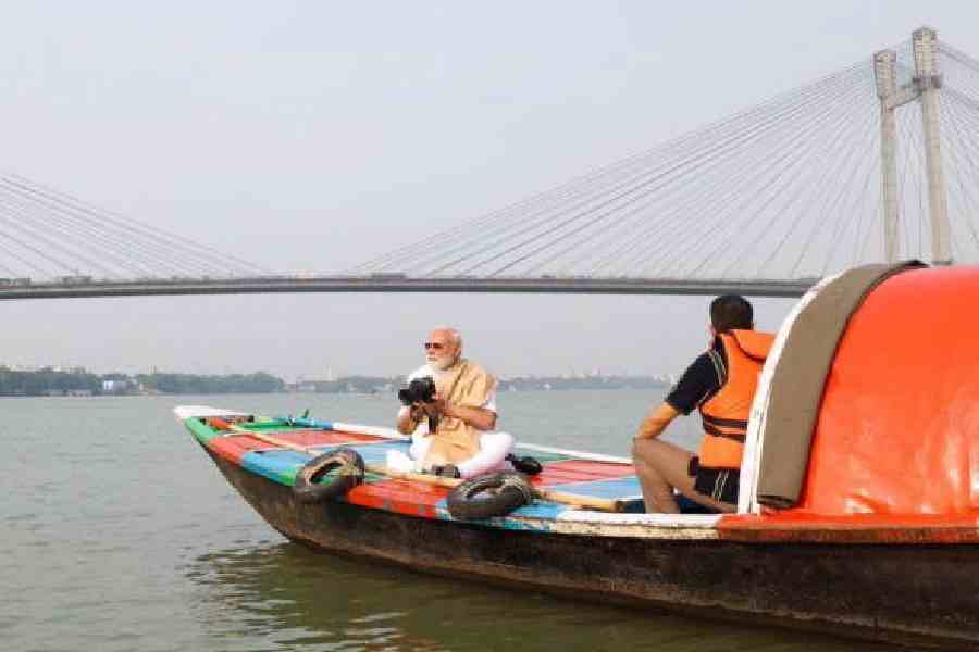 Narendra Modi during the boat ride on the Hooghly in Calcutta on Friday. (@narendramodi/X via PTI Photo)