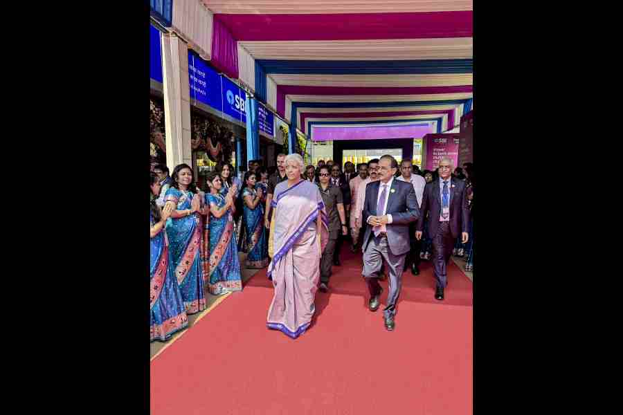 Nirmala Sitharaman with SBI chairman CS Setty in Pune on Friday.