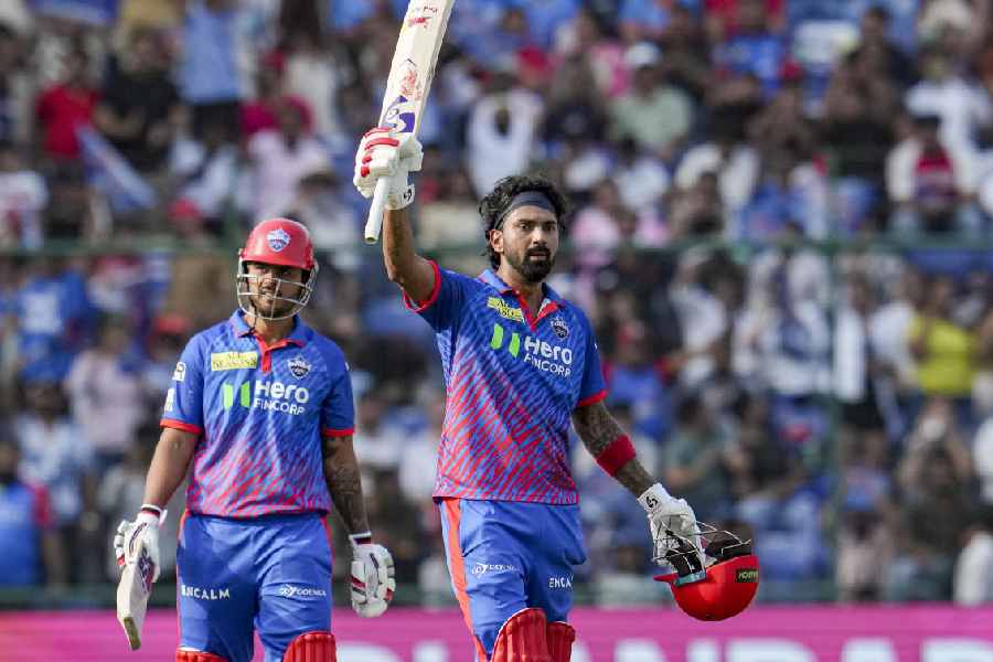 Delhi Capitals' KL Rahul, right, celebrates his century during the Indian Premier League (IPL) 2026 T20 cricket match between Punjab Kings and Delhi Capitals, in New Delhi, Saturday, April 25, 2026.