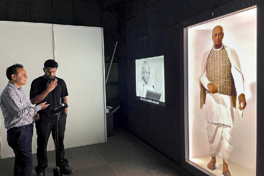 A visitor interacts with an AI-powered hyper-realistic 3D avatar of Sardar Vallabhbhai Patel, at the Pradhanmantri Sangrahalaya, in New Delhi, Thursday, April 23, 2026.