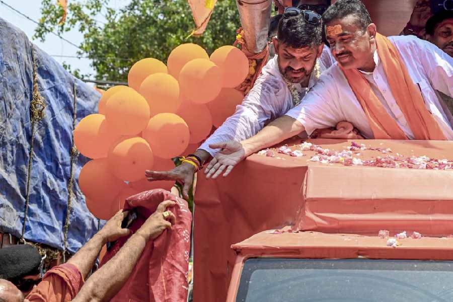 West Bengal Leader of Opposition and BJP leader Suvendu Adhikari during a roadshow in support of party candidate Rakesh Singh for the Kolkata Port Assembly constituency ahead of the second phase of the Assembly elections, in Kolkata, West Bengal, Saturday, April 25, 2026.