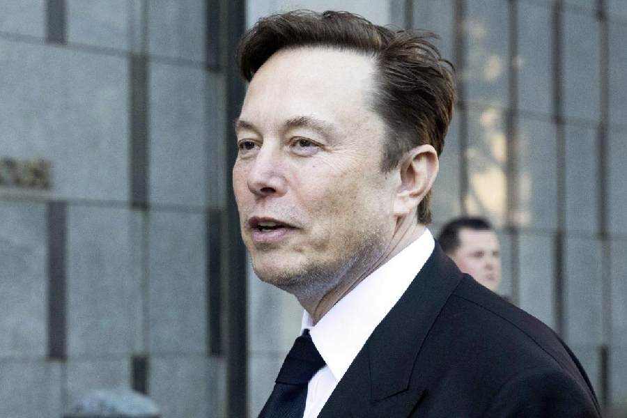 Elon Musk departs the Phillip Burton Federal Building and United States Court House in San Francisco on Jan. 24, 2023.