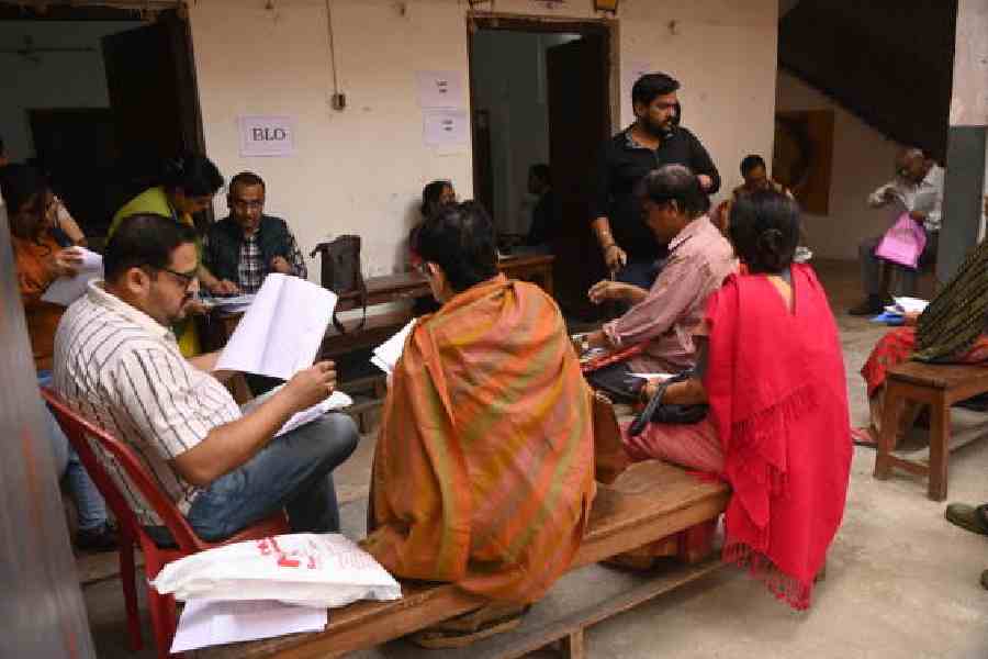 Voters at an SIR hearing centre earlier this month
