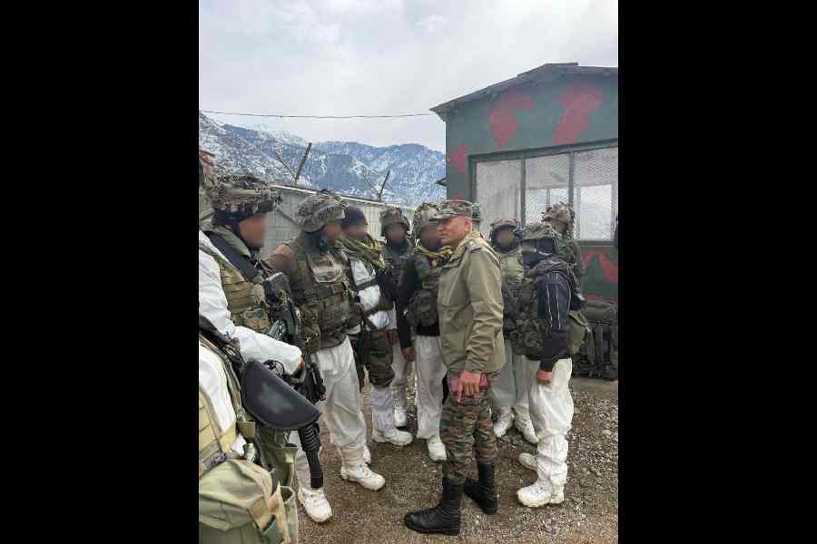 The Northern Army Commander, Lt Gen Pratik Sharma, interacts with security personnel during a review of operational preparedness and the counter-terror grid in Kishtwar, Jammu and Kashmir, on Saturday.